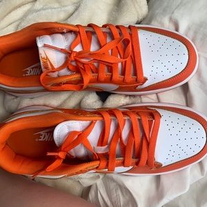 orange and white sneakers